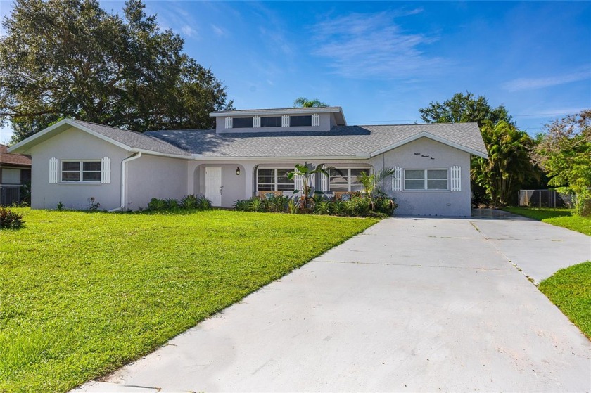 Come see this beautiful remodeled 3 bedrooms/ 3 bath with a - Beach Home for sale in Englewood, Florida on Beachhouse.com