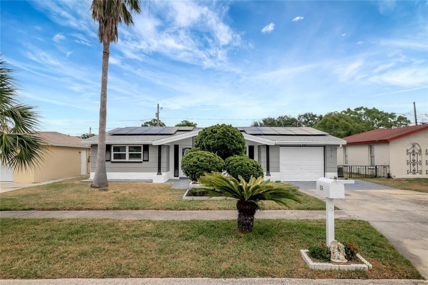 Discover the perfect blend of potential and location with this - Beach Home for sale in Holiday, Florida on Beachhouse.com