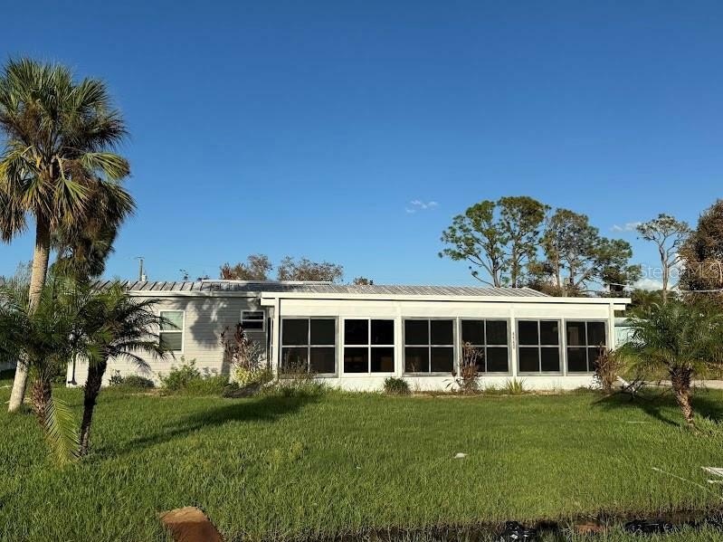 Charming 2-bedroom, 2-bathroom mobile home on a spacious double - Beach Home for sale in Port Charlotte, Florida on Beachhouse.com