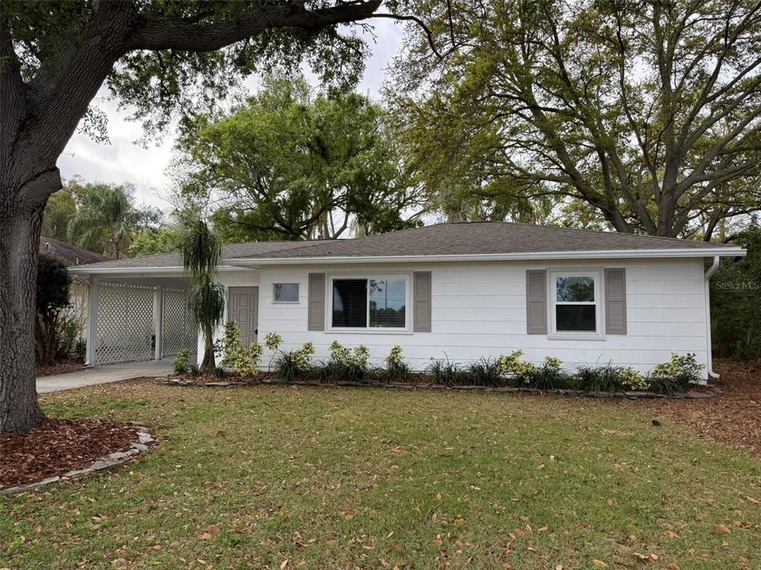 Beautiful, updated 2-bedroom, 1-bath home situated on nearly a - Beach Home for sale in Clearwater, Florida on Beachhouse.com