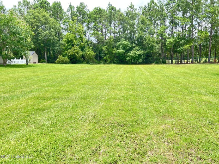 This Beautiful vacant lot, primed for your dream home, situated - Beach Lot for sale in Bay Saint Louis, Mississippi on Beachhouse.com