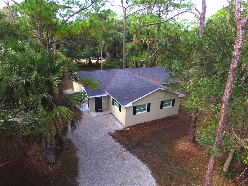 Completely renovated 3/2 CBK home on 1.3 wooded acres providing - Beach Home for sale in Vero Beach, Florida on Beachhouse.com