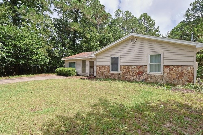 Over 1/3 acre with a pond just 6 miles west of Hurlburt Field! - Beach Home for sale in Mary Esther, Florida on Beachhouse.com