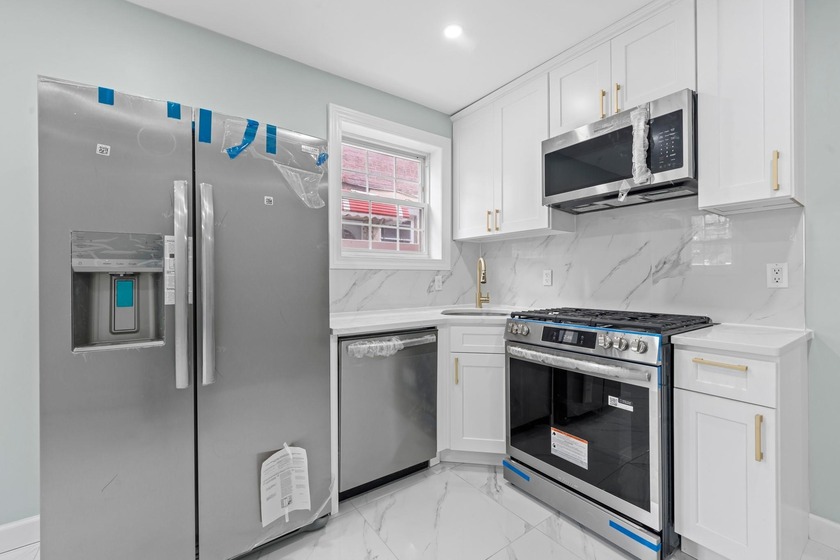 2819 Schurz Avenue is a meticulously renovated 100% Built BRICK - Beach Townhome/Townhouse for sale in Bronx, New York on Beachhouse.com