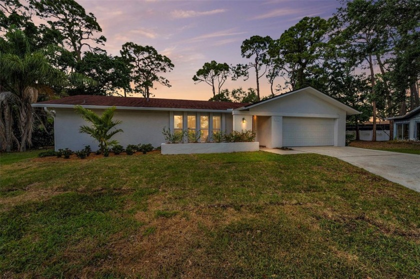 Fully Renovated 3-Bedroom, 2-Bath Canal Pool Home in Feather - Beach Home for sale in Clearwater, Florida on Beachhouse.com