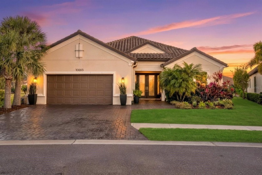 Located in the highly desirable Esplanade at Artisan Lakes, this - Beach Home for sale in Palmetto, Florida on Beachhouse.com