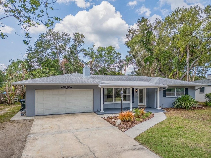 Under contract-accepting backup offers. Tropical Dunedin Oasis! - Beach Home for sale in Dunedin, Florida on Beachhouse.com