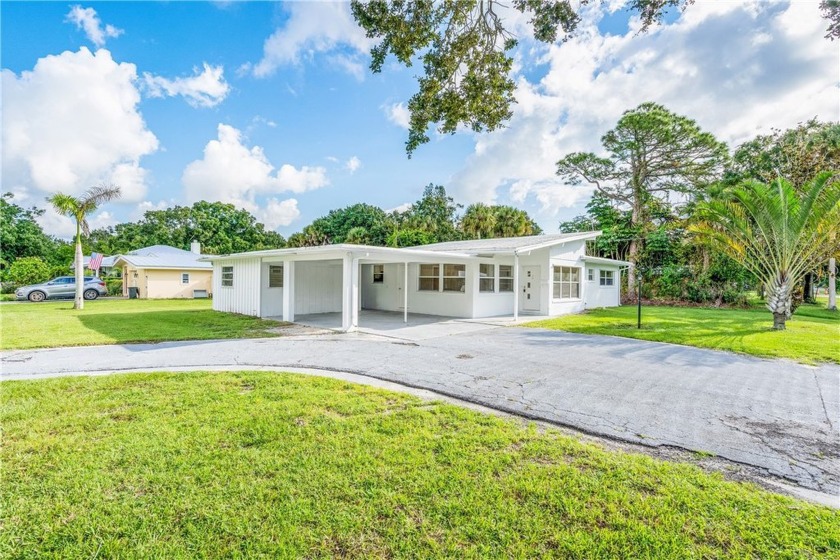 Architecturally exciting home features vaulted beamed ceilings - Beach Home for sale in Vero Beach, Florida on Beachhouse.com