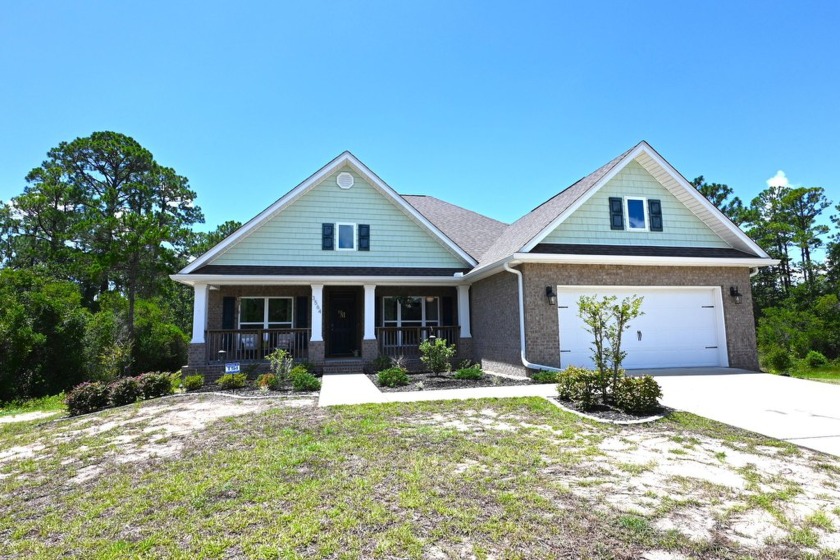 This waterfront all brick home is on 2.8 acres with 80 feet on - Beach Home for sale in Navarre, Florida on Beachhouse.com