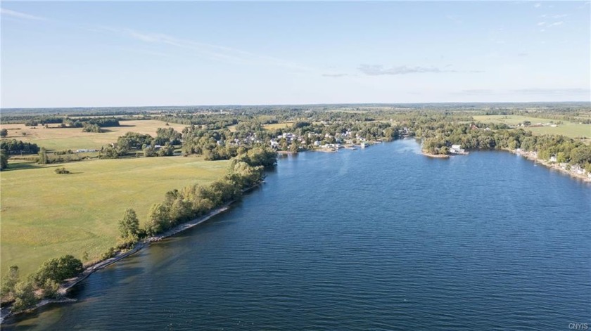 Looking for a generous lot with pristine waterfront in an - Beach Acreage for sale in Three Mile Bay, New York on Beachhouse.com