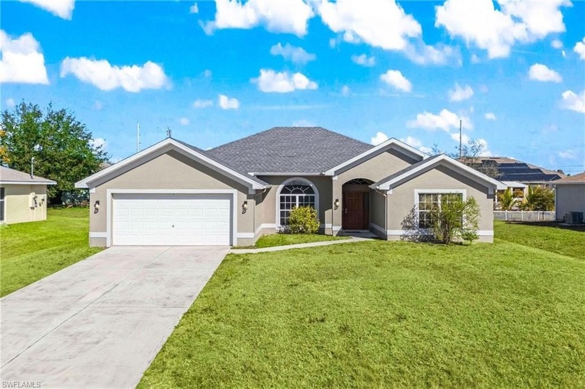 Nestled in a peaceful Cape Coral neighborhood, this spacious - Beach Home for sale in Cape Coral, Florida on Beachhouse.com