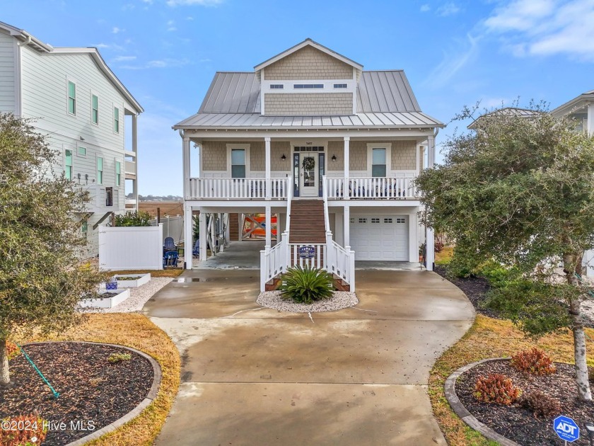 Prepare to be swept away by expansive marsh views and - Beach Home for sale in Oak Island, North Carolina on Beachhouse.com