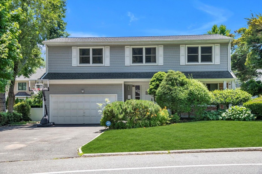 Welcome to this beautifully renovated colonial nestled in the - Beach Home for sale in Great Neck, New York on Beachhouse.com