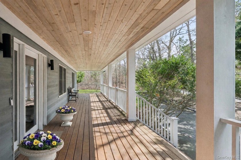 Welcome to a beautifully curated, turn-key farmhouse set on just - Beach Home for sale in Hampton Bays, New York on Beachhouse.com