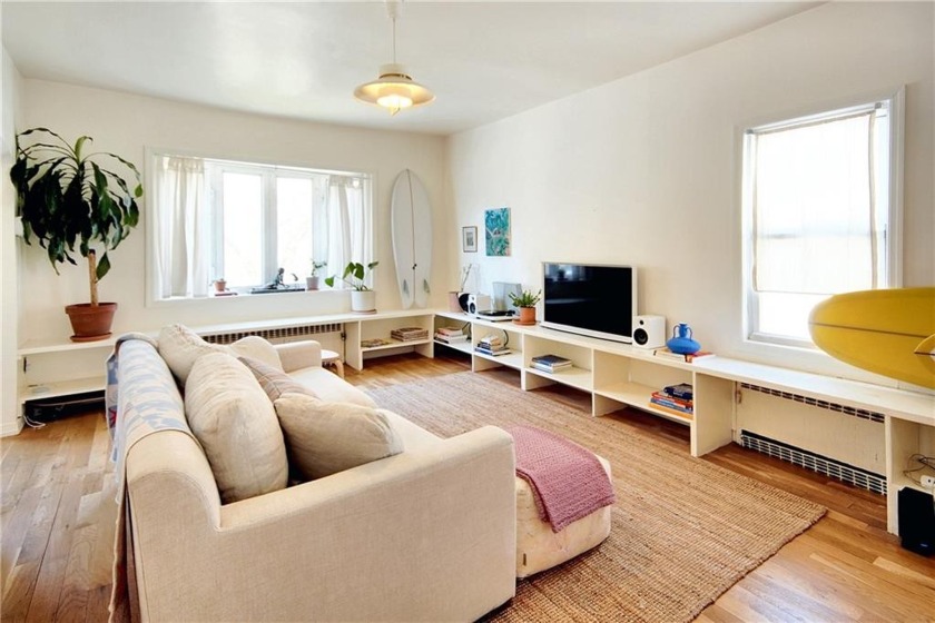 Welcome to your dream beach bungalow! This sunlit oasis offers - Beach Home for sale in Arverne, New York on Beachhouse.com