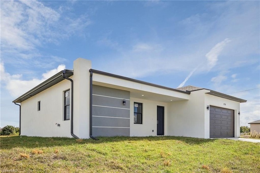 Move-in Ready New Construction! This beautiful 3-bedroom, 2 - Beach Home for sale in Lehigh Acres, Florida on Beachhouse.com