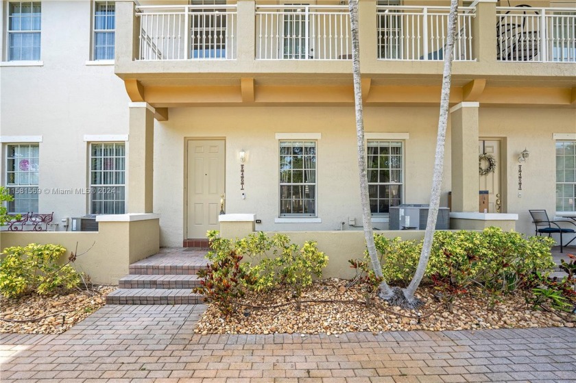 Discover modern living just 10 minutes from the beach in this - Beach Townhome/Townhouse for sale in Boynton Beach, Florida on Beachhouse.com