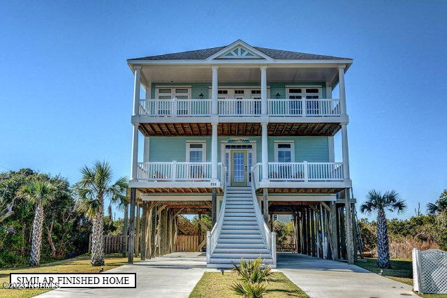 Welcome to 124 Old Village Lane! This 3269 sq. ft., 6 bed, 4.5 - Beach Home for sale in North Topsail Beach, North Carolina on Beachhouse.com