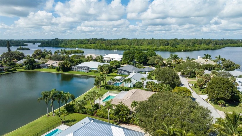 This beautifully landscaped .37 acre lakefront, pool home is - Beach Home for sale in Vero Beach, Florida on Beachhouse.com