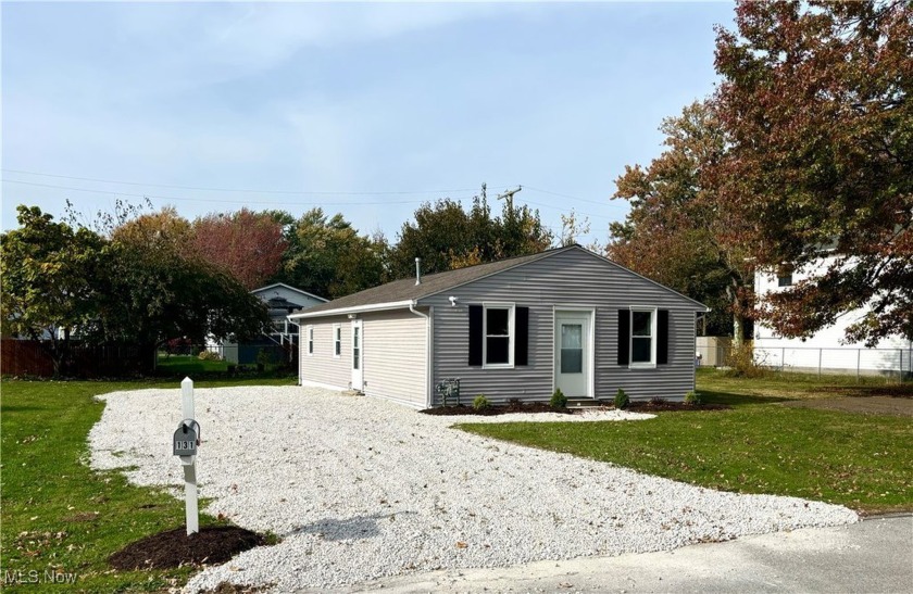 Located on a triple lot with a frontage of 114', this completely - Beach Home for sale in Painesville, Ohio on Beachhouse.com