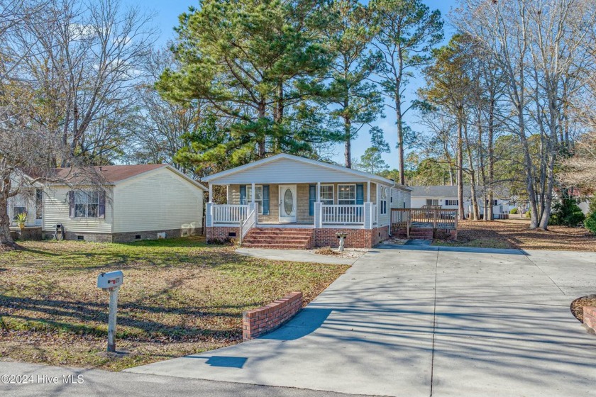 Welcome home to 1070 Waterview Lane. This three-bedroom and - Beach Home for sale in Carolina Shores, North Carolina on Beachhouse.com