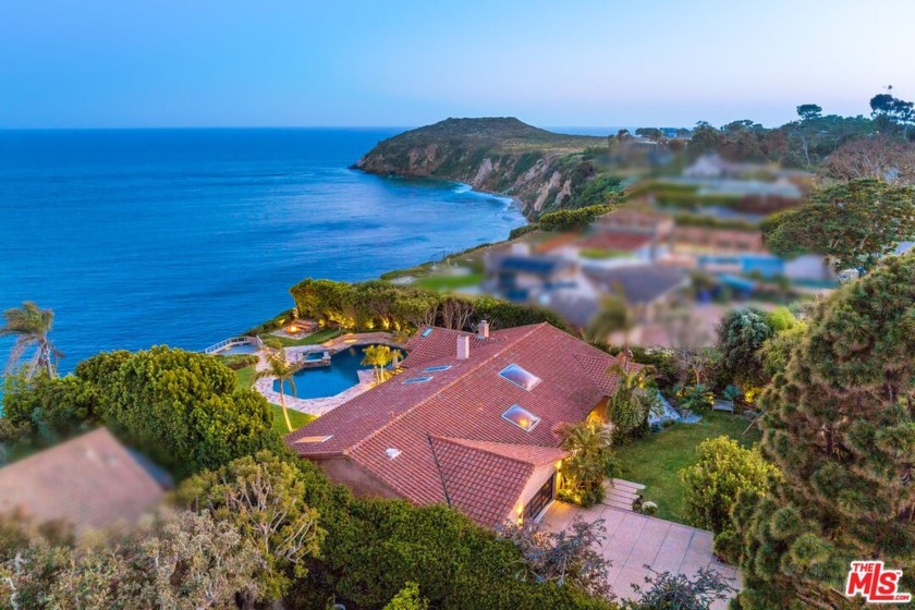 Exceptionally private and awash with natural light, this gated - Beach Home for sale in Malibu, California on Beachhouse.com