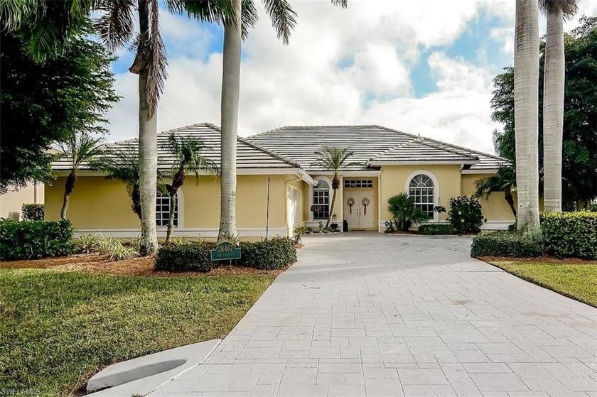 Experience serene lakeside and golf course living in this - Beach Home for sale in Bonita Springs, Florida on Beachhouse.com