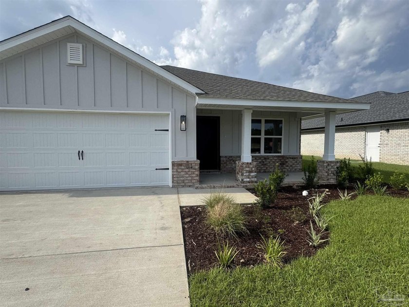 Welcome to this beautifully TTB 3-bedroom, 2-bath home offering - Beach Home for sale in Milton, Florida on Beachhouse.com
