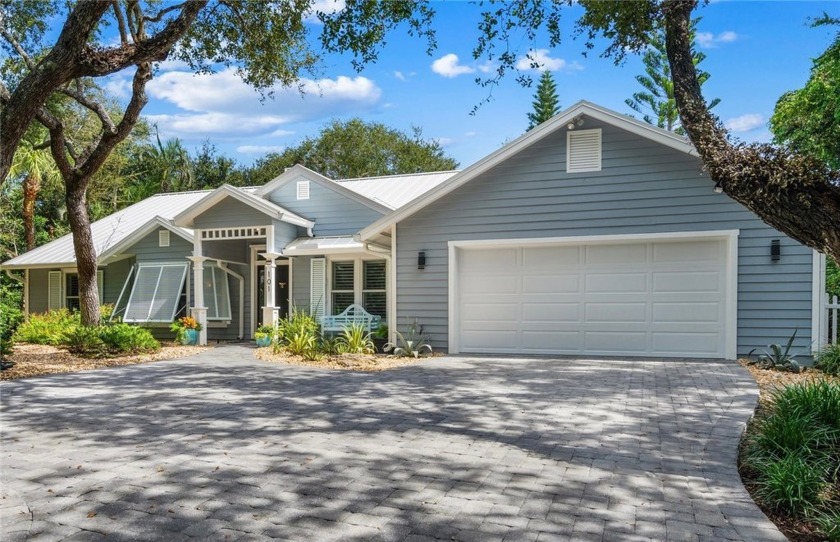 Tucked inside a sprawling oak canopy, this 4BR/3BA Coastal - Beach Home for sale in Indian River Shores, Florida on Beachhouse.com