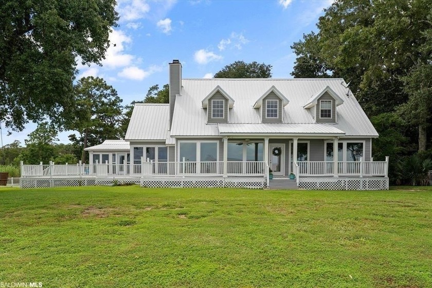 Welcome home to this stunning 4-bed/3-bath Southern Coastal - Beach Home for sale in Coden, Alabama on Beachhouse.com