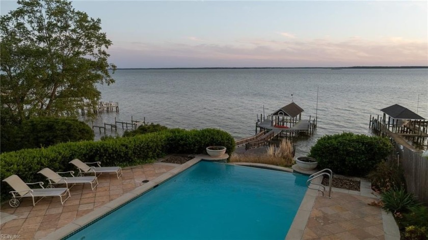 Nestled along the picturesque James River in Blunt Point Estates - Beach Home for sale in Newport News, Virginia on Beachhouse.com