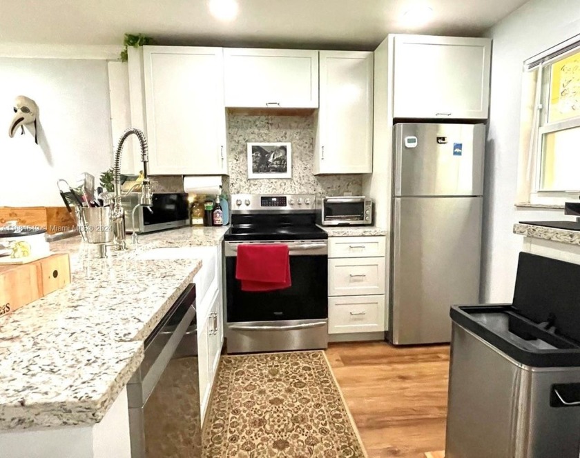 Discover your dream home in this fully renovated corner unit at - Beach Condo for sale in Tamarac, Florida on Beachhouse.com