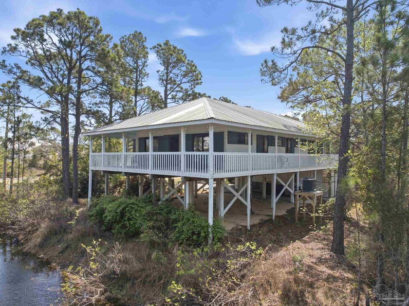 Beautiful Caribbean-style home in the quiet, off-the-beaten-path - Beach Home for sale in Gulf Shores, Alabama on Beachhouse.com