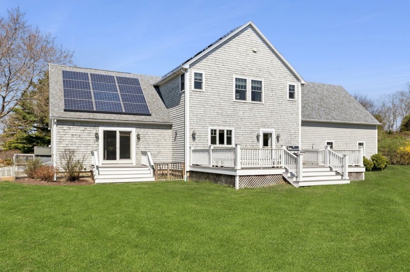 Tucked away on a shy acre, this private retreat features a - Beach Home for sale in Shelter Island, New York on Beachhouse.com