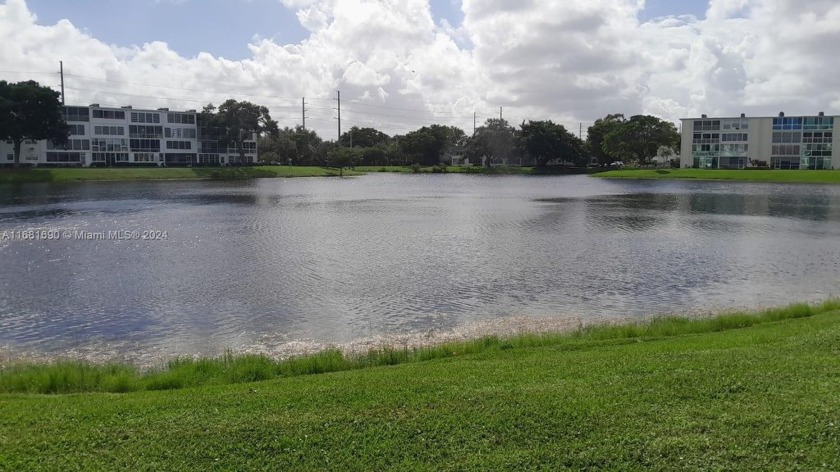 YOU CAN'T MISS THIS GORGEOUS FIRST FLOOR LAKE FRONT UNIT IN THE - Beach Condo for sale in Deerfield Beach, Florida on Beachhouse.com