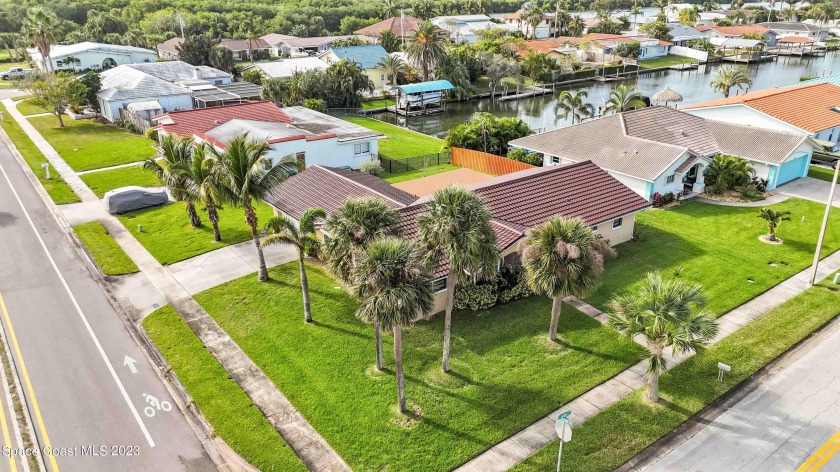 Seller Welcomes Offers on this Immaculate Canal View Home. NO - Beach Home for sale in Cocoa Beach, Florida on Beachhouse.com