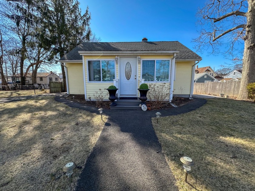 Welcome to Momauguin! This well-cared-for coastal cottage is - Beach Home for sale in East Haven, Connecticut on Beachhouse.com