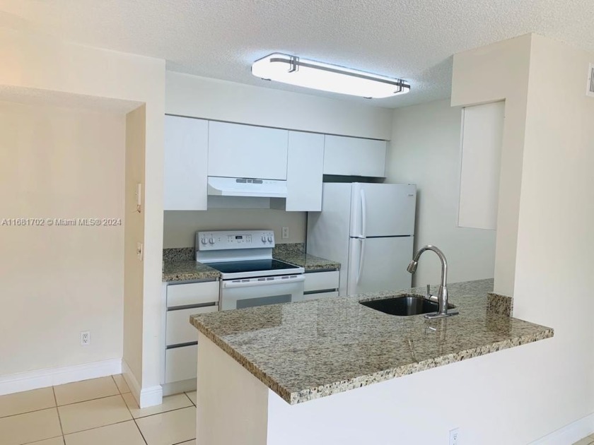 UPDATED AND SPACIOUS 2 BEDROOMS AND 2 BATHS ON FIST FLOOR CONDO - Beach Condo for sale in Pembroke Pines, Florida on Beachhouse.com