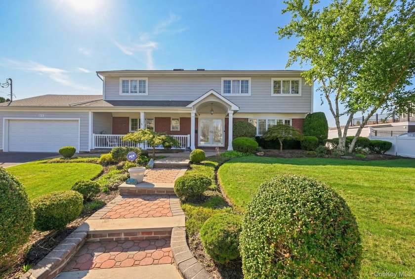 Immaculate colonial set on a quiet, tucked-away residential - Beach Home for sale in Massapequa Park, New York on Beachhouse.com