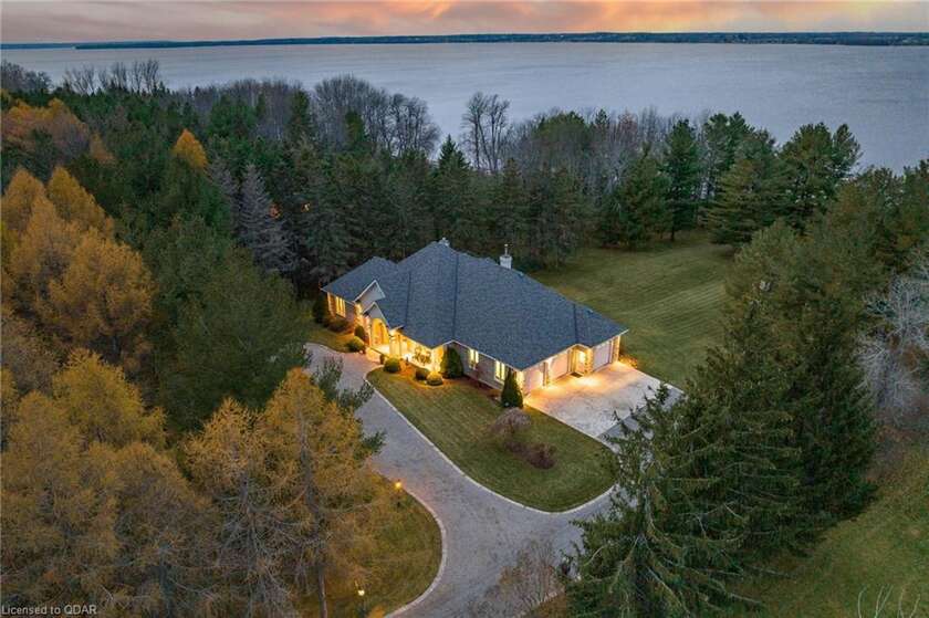 This spectacular waterfront estate has it all on 3+ Acres! The - Beach Home for sale in Picton, Ontario on Beachhouse.com