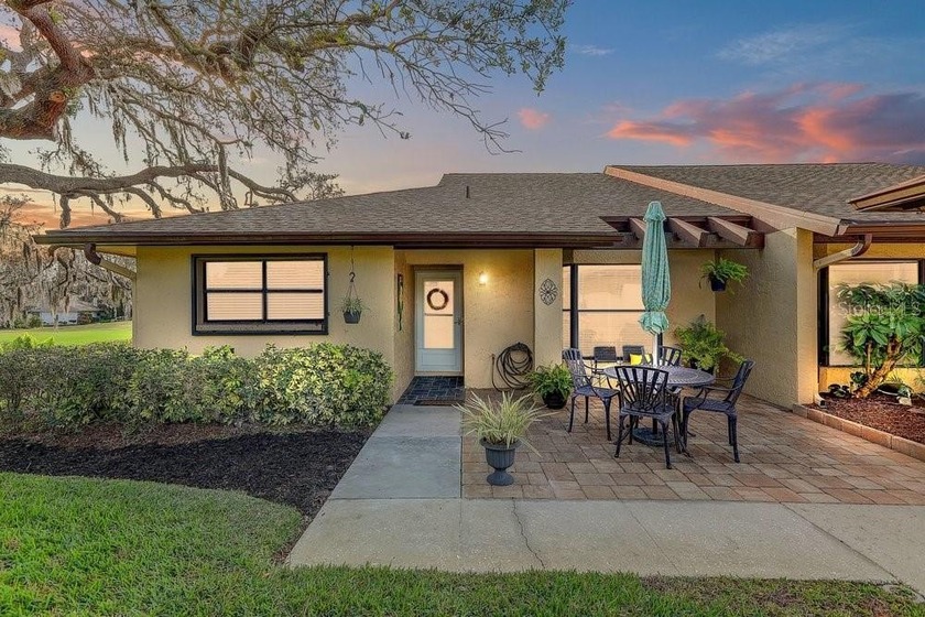 Welcome to 3454 Niblick Court, a beautifully maintained end-unit - Beach Condo for sale in New Port Richey, Florida on Beachhouse.com