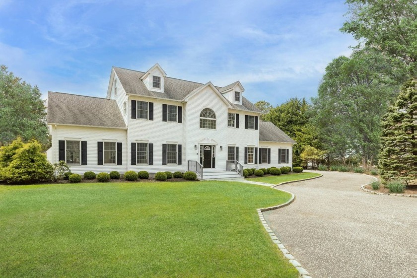 Tucked at the end of a quiet cul-de-sac and bordered by more - Beach Home for sale in Hampton Bays, New York on Beachhouse.com