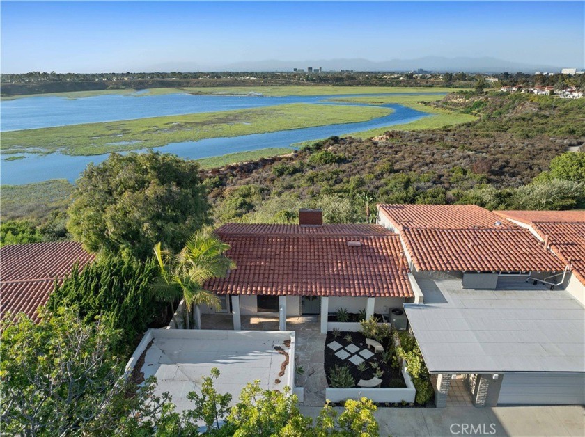 Enjoy expansive Back Bay views from this well loved Bluffs home - Beach Home for sale in Newport Beach, California on Beachhouse.com