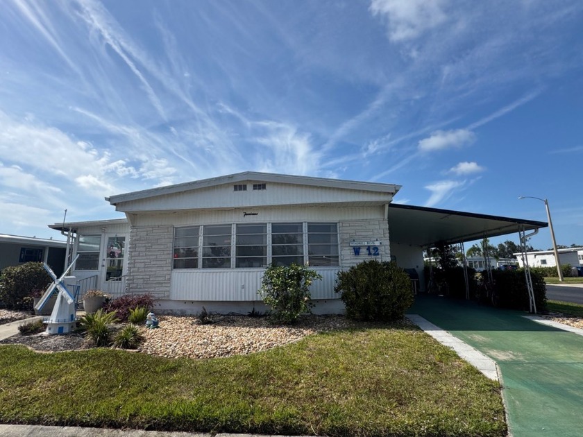 This updated 1969 mobile home is a rare find, offering three - Beach Home for sale in Bradenton, Florida on Beachhouse.com