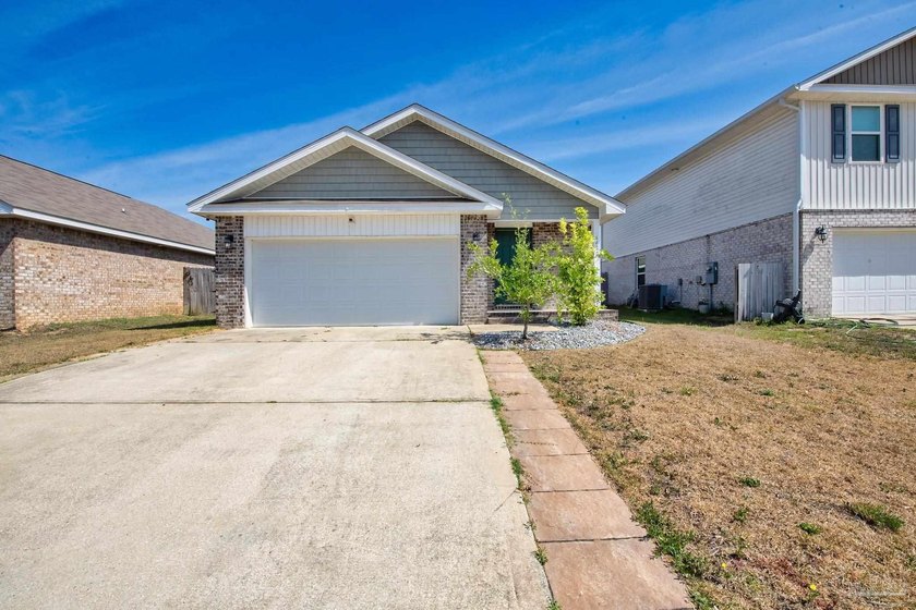 VA ASSUMABLE LOAN ! Welcome to this charming home in the heart - Beach Home for sale in Milton, Florida on Beachhouse.com