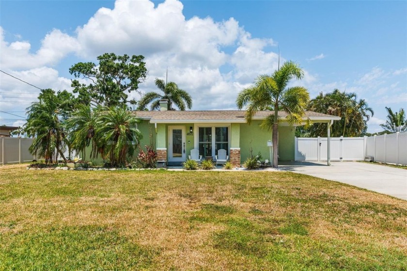 A waterfront oasis in the heart of Shore Acres! Enjoy the serene - Beach Home for sale in St. Petersburg, Florida on Beachhouse.com