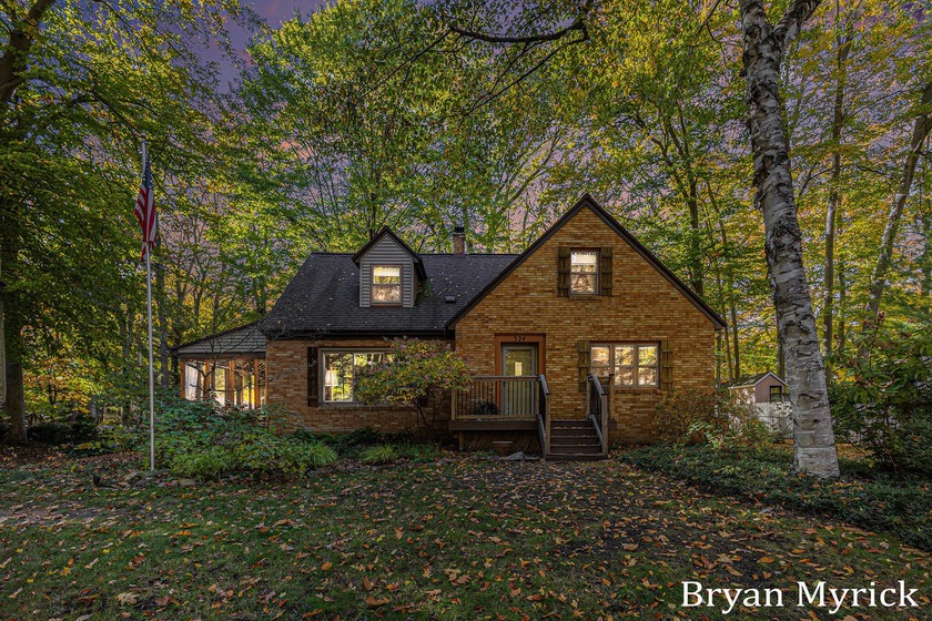 Don't miss this inviting 4-bedroom, 2-bath brick Cape Cod with - Beach Home for sale in Holland, Michigan on Beachhouse.com