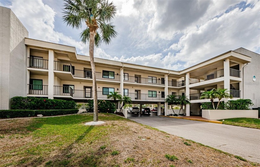 Welcome to your waterfront END UNIT oasis at 8210 Aquila St - Beach Condo for sale in Port Richey, Florida on Beachhouse.com