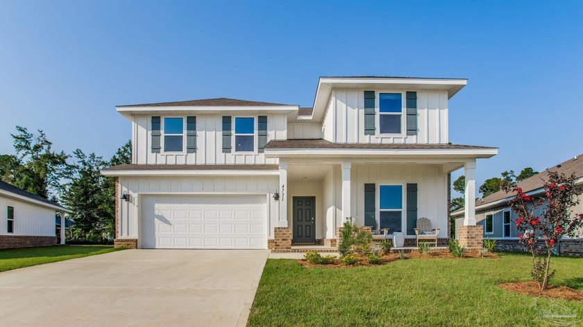 Welcome to Lakes of Woodbine! This beautiful home features 4 - Beach Home for sale in Pace, Florida on Beachhouse.com