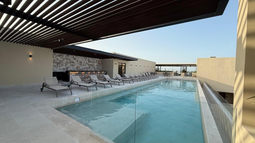 Live in one of Playa del Carmen's most vibrant and - Beach Condo for sale in Playa Del Carmen,  on Beachhouse.com